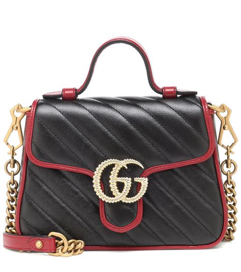 gucci top handle crossbody bag.